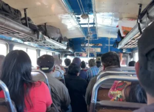 The view from the inside of a full chicken bus going from Antigua to Lake Atitlan