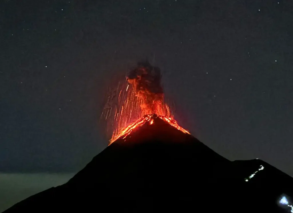 A picture of Acatenango Volcano erupting at night