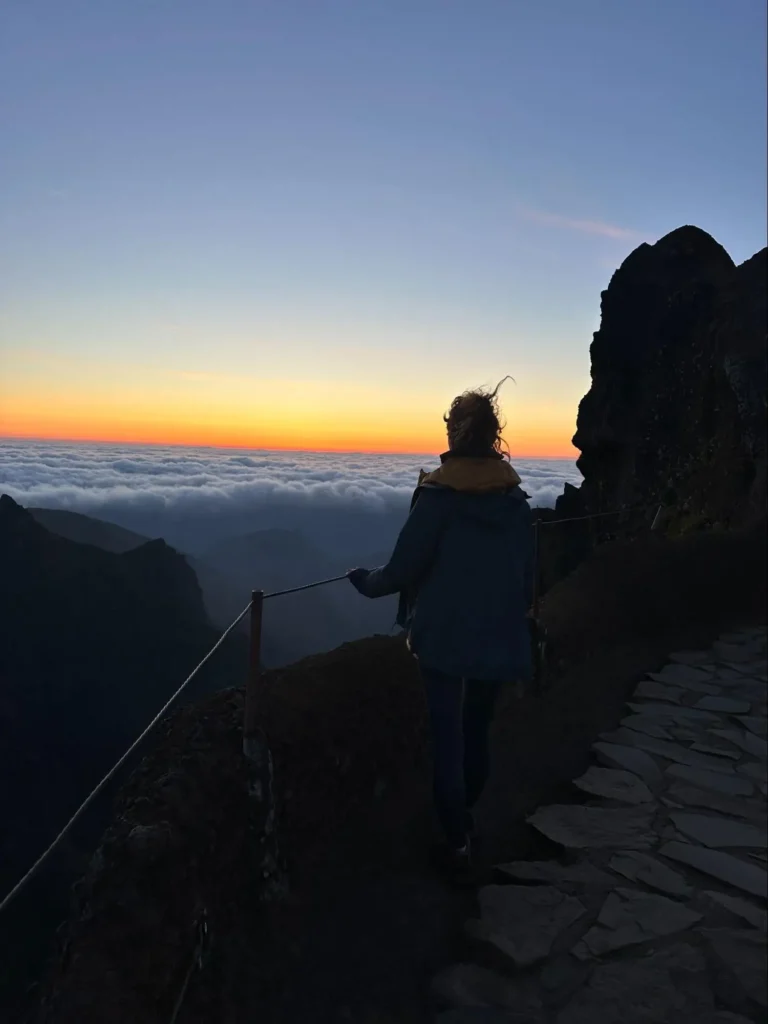 Laura looking over a Madeira cloud inversion at sunset
