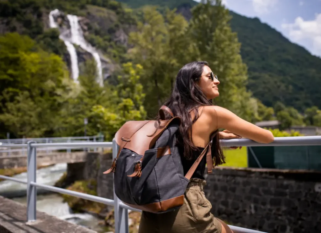A woman travelling solo with a small backpack