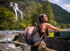 A woman travelling solo with a small backpack