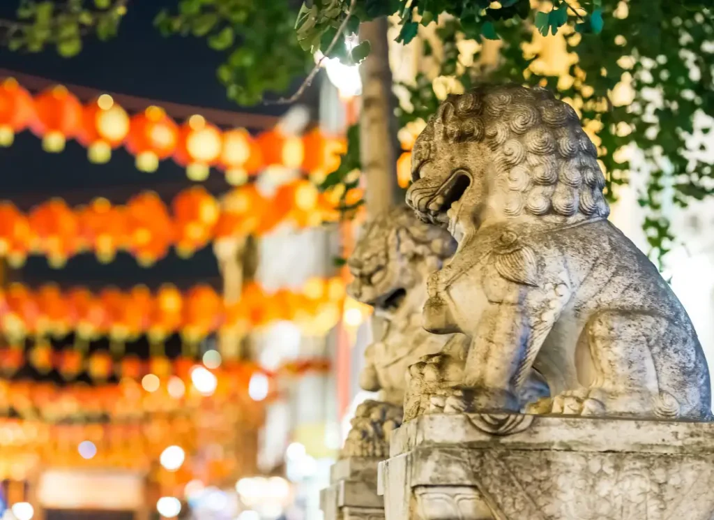 A lion statue in front of a vegetarian restaurant in Chinatown, London
