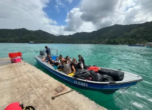 A group of people on a speed boat between Panama and Colombia