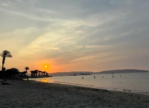 The sunset on the beach in Huacachina before taking the overnight bus from Huacachina to Cusco