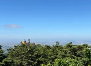 A view of Pena Palace in Sintra from a distance, one of my favourite things to do in Portugal