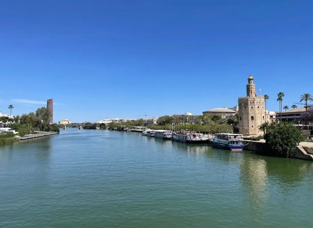 A view from a bridge over the Guadaquivir river in Seville, Spain | What to Pack for Spain