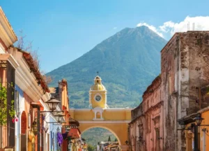Antigua city with a volcano in the background